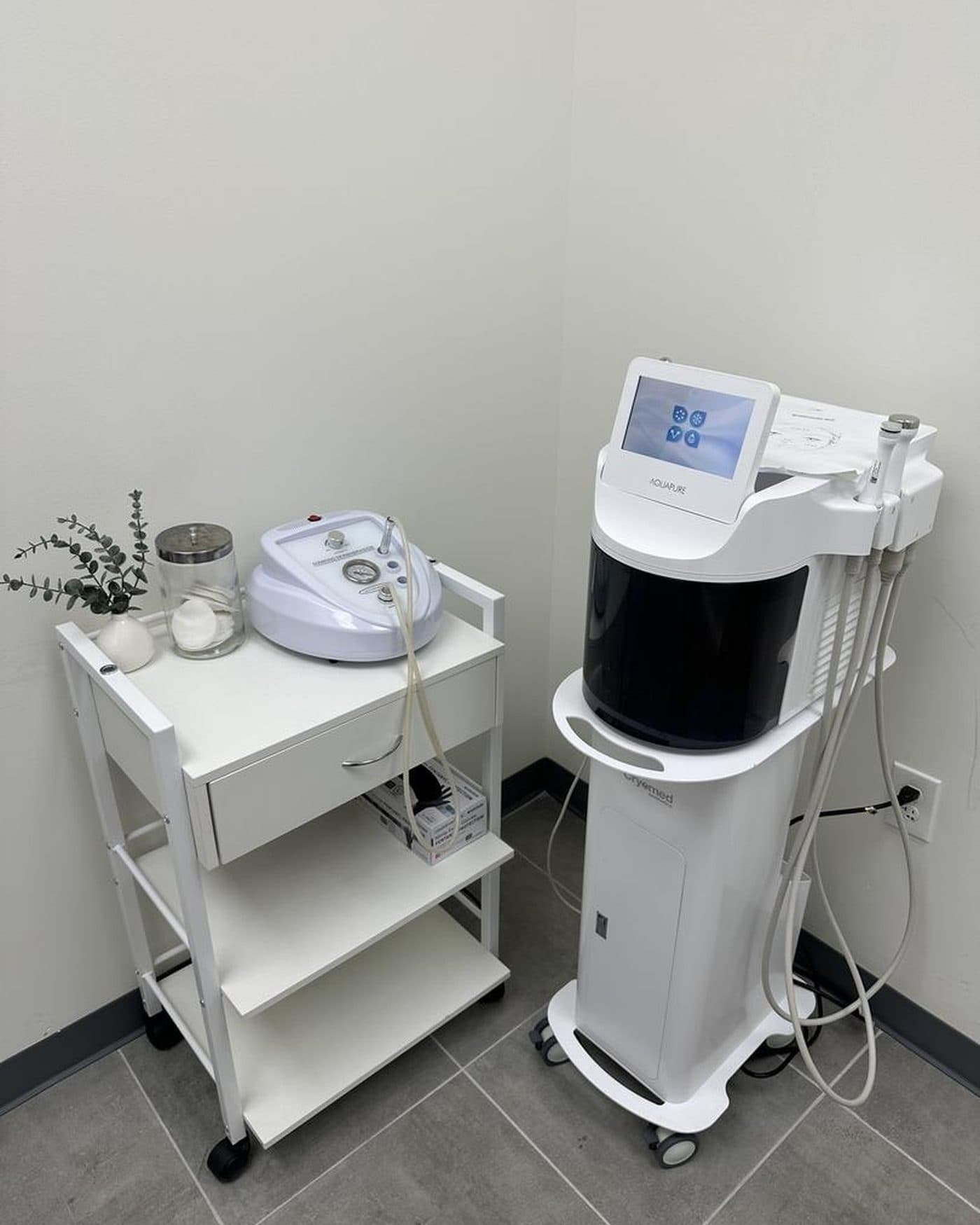 The Aquapure device on its cart in a Rewind Bar treatment room