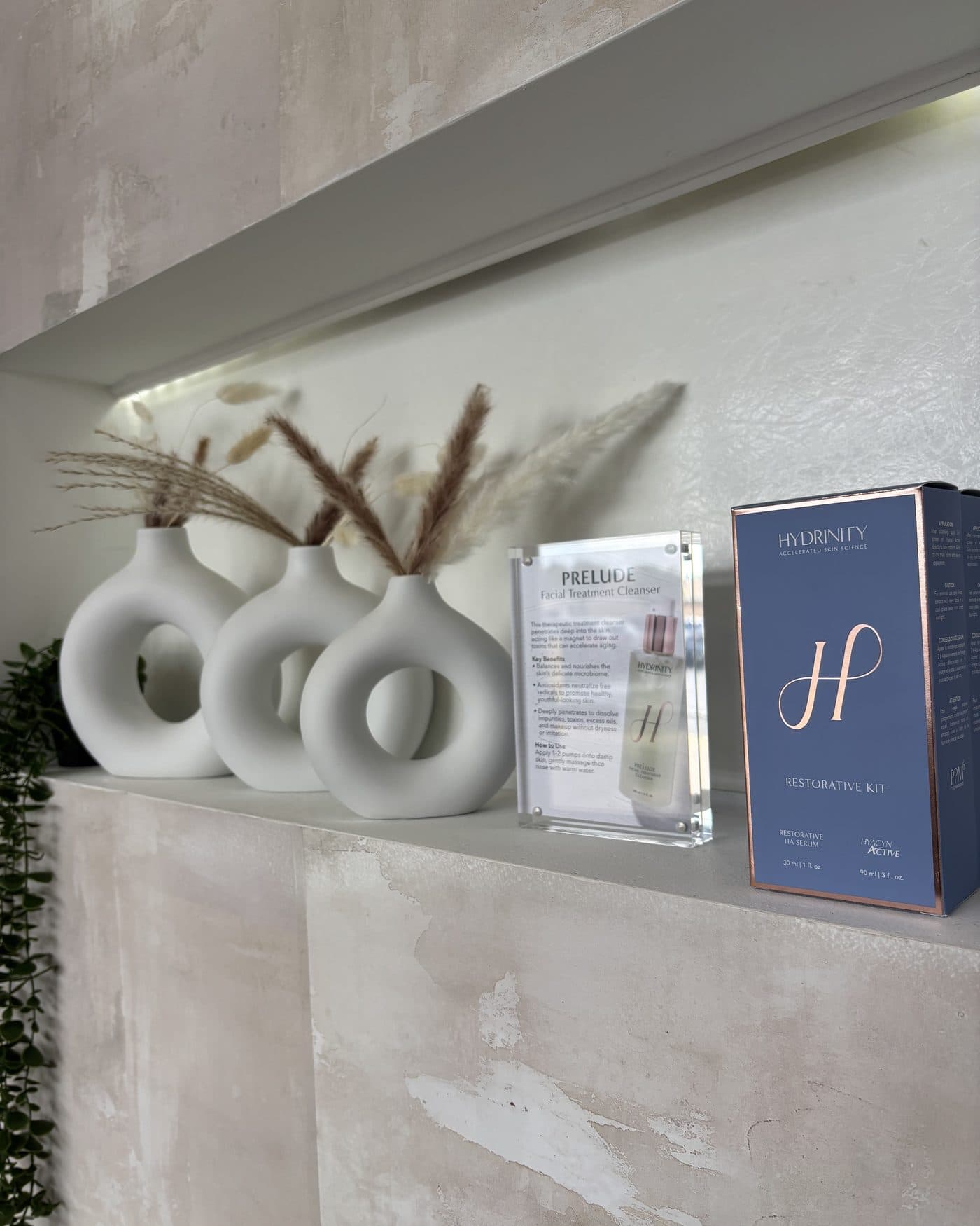 Hydrinity skincare on the retail ledge at Rewind Bar