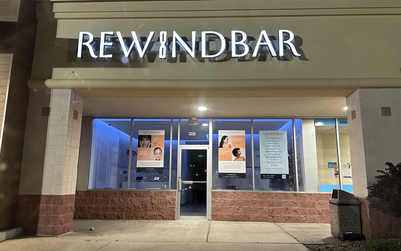 The Rewind Bar sign over the clinic entrance in South Plainfield